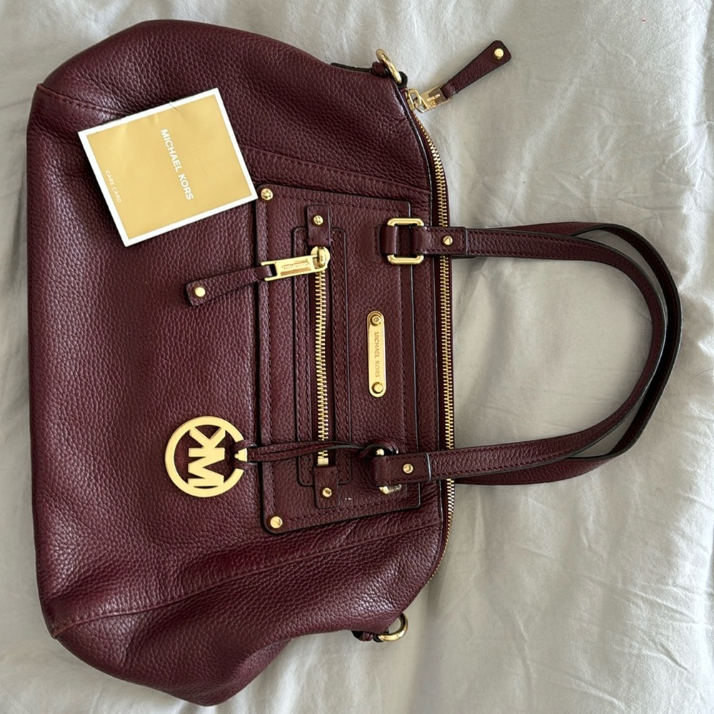 Beautiful burgundy leather Michael Kors bag.
